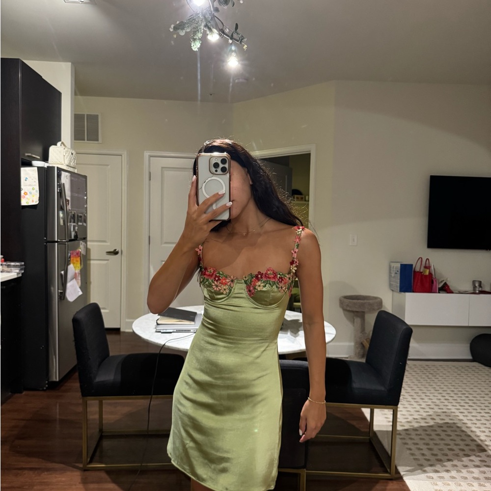 Elegant Green Satin Dress with Floral Accents